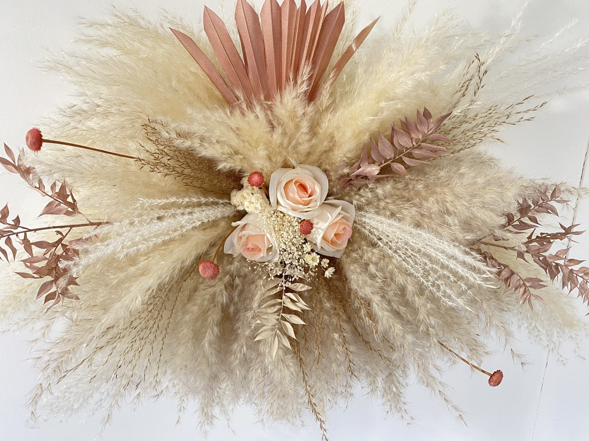 Norfolk Pampas Cloud on wall. Ideal for weddings, special events, or birthday gift for her. Dried flowers including a white preserved rose centre piece.